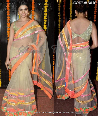 3010 Prachi Desai's beige and neon saree outfit set